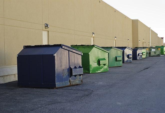 a row of industrial dumpsters for construction waste in Gadsden, AZ